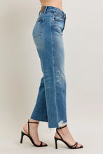 Load image into Gallery viewer, Unleash your inner fashionista with our HW Destroy Hem Crop Wide Leg Jeans by Judy Blue. Made with a high waist and rigid magic construction, these jeans are designed to flatter your figure while providing all-day comfort. The destroyed hem and wide leg a