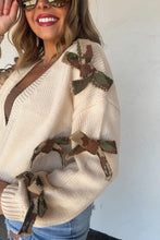 Load image into Gallery viewer, The trendiest cardigan of the season and sure to be a HIT! These crop knit, open front cardigans featuring knit camo and cheetah bows with a slight bubble sleeve arm.