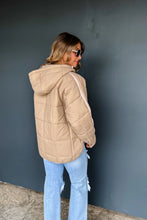 Load image into Gallery viewer, Stay warm and stylish cooler weather with the Peyton Puffer Jacket. Features a quilted pattern style with detail to all the trims! Has a hidden zip front pocket, snap button neckline, two side pockets, and a hoodie with pull tabs. Its high-quality mate