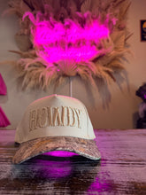 Load image into Gallery viewer, Cute enough to turn heads, sassy enough to keep ’em staring. The Howdy trucker hat delivers that instant “I run the show” energy wrapped in a Western twist.