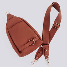 Load image into Gallery viewer, this versatile bag will be here for all your adventures as you can wear it for any and all occasions. It comes with a removable solid canvas strap, open interior pocket, and sliding O-ring for ultimate convenience while it allows you to wear your sling ba