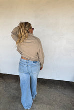 Load image into Gallery viewer, We spared no attention to detail in this raw hem/semi crop pullover! Such a relaxed, trendy look! Has a slouchy fit, vintage wash, exposed seaming and ribbed cuffs. Has super soft terry "sweatshirt" feel on the inside! Fit: Oversized, slouchy fit with