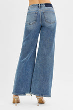 Load image into Gallery viewer, Our Hannah Tummy Control Mid Rise Fit Wide Jeans provide a comfortable and flattering fit. These jeans offer a slimming effect. The high-quality denim is designed to smooth and shape your figure. Perfect for everyday wear.