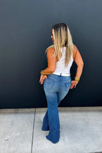 Load image into Gallery viewer, THREE WORDS! TUMMY. CONTROL.PANNEL. We are SO excited to not only launch these stretchy, light distressed flares, BUT, having a tummy control panel is a game changer with a NEW DESIGN! Take sides in style with our PINSTRIPE JEAN! Perfect for game day o