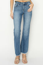 Load image into Gallery viewer, Mid Rise Fray Hem Boot Cut Jeans.