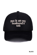Load image into Gallery viewer, Turn heads and spark smiles with this mesh “Put It on My Husband’s Tab” trucker hat. The breathable mesh back keeps it cool and comfy, while the bold statement adds the perfect touch of humor to any casual outfit.