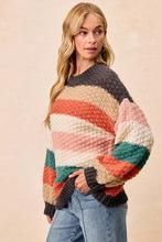Load image into Gallery viewer, Meet The Pop of Cozy Pullover—where bold color meets all-day comfort. This chunky knit sweater features eye-catching striped color blocking that adds the perfect pop to your cold-weather wardrobe. Designed with a relaxed, easy fit and ultra-soft texture, 
