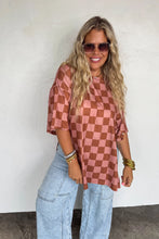 Load image into Gallery viewer, Cloud soft and so so stretchy! This bold checker top features an oversized fit with side slits. Matches perfectly with our bold block checker pants. Wear it as a set or alone with leggings or biker shorts!    The perfect way to add a "pop" to any outfit! 
