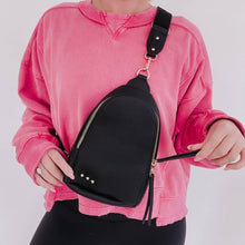 Load image into Gallery viewer, this versatile bag will be here for all your adventures as you can wear it for any and all occasions. It comes with a removable solid canvas strap, open interior pocket, and sliding O-ring for ultimate convenience while it allows you to wear your sling ba
