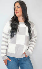 Load image into Gallery viewer, Get ready to conquer the day in style with our Mocha Checkmate Stripes Sweater by Salty Wave! Made with soft, high-quality fabric, this sweater features a trendy checkmate with a stripe pattern on arms that will make you stand out from the crowd. Perfect 
