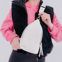 Load image into Gallery viewer, this versatile bag will be here for all your adventures as you can wear it for any and all occasions. It comes with a removable solid canvas strap, open interior pocket, and sliding O-ring for ultimate convenience while it allows you to wear your sling ba
