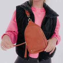 Load image into Gallery viewer, this versatile bag will be here for all your adventures as you can wear it for any and all occasions. It comes with a removable solid canvas strap, open interior pocket, and sliding O-ring for ultimate convenience while it allows you to wear your sling ba

