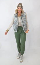 Load image into Gallery viewer, Meet your new cool girl layer. This Salty Wave Chic Camo Vest brings that “effortlessly outdoorsy but make it chic” vibe we’re obsessed with. ♀️  Why You’ll Love It: Lightweight yet cozy—perfect for layering Neutral camo print that pairs with everything Zip-up
